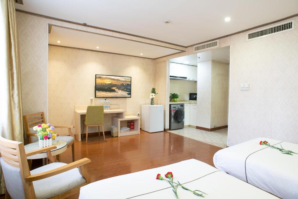 Студио (Апартаменты с 2 отдельными кроватями), Guangzhou Xin Yue Xin Hotel
