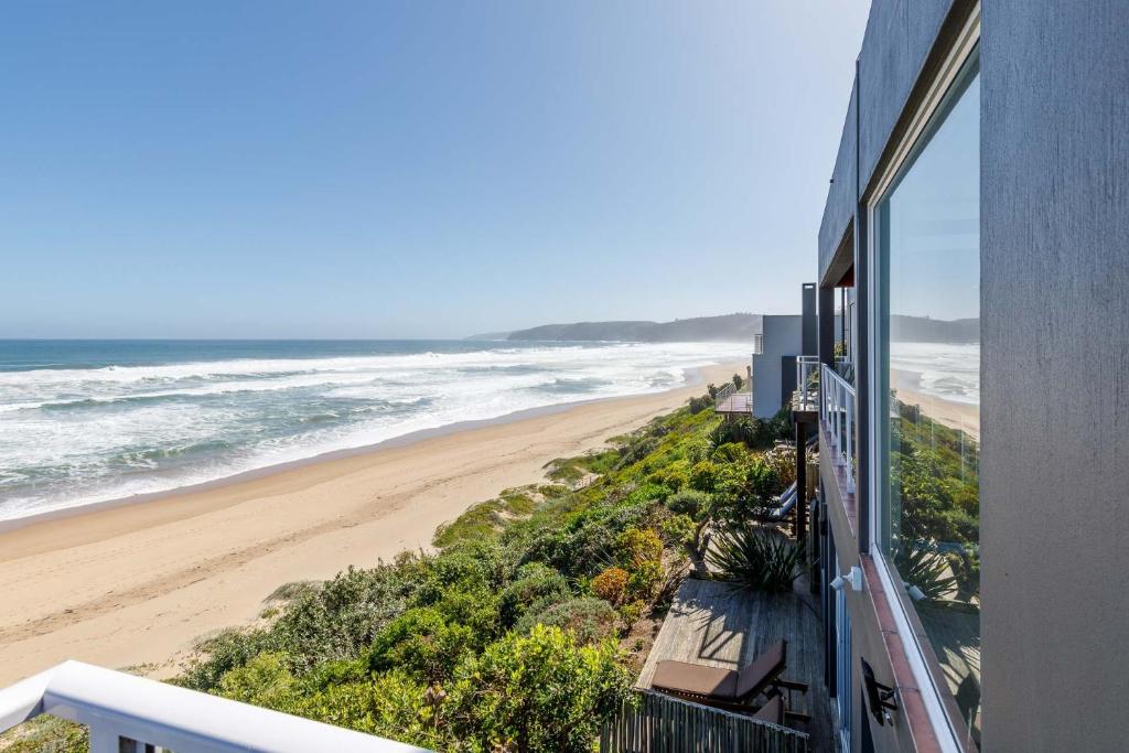 Dune Beach House - Tap to explore photos