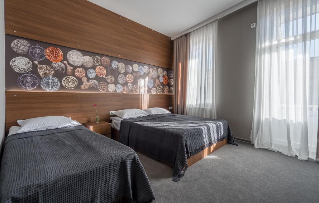 Hotel History • სასტუმრო ისტორია Room Type - Standard Triple Room