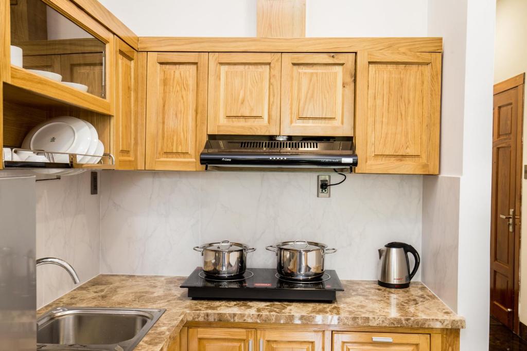 Апартаменты (Апартаменты с 2 спальнями), Kim Minh Apartment & Hotel