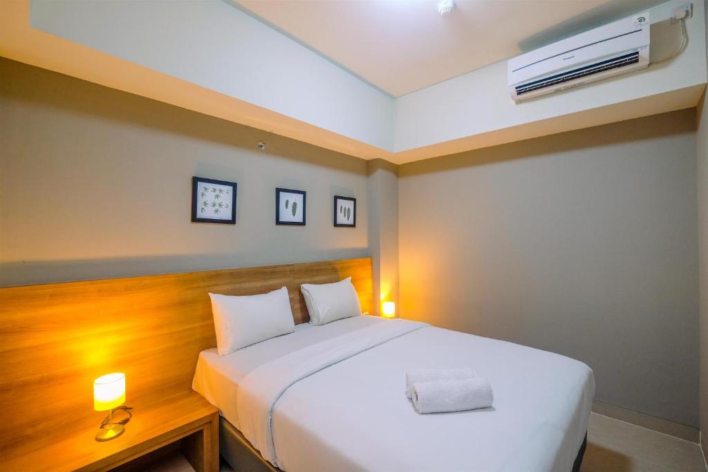 Chic and Cozy 1BR Apartment at Mustika Golf Residence By Travelio photo 2