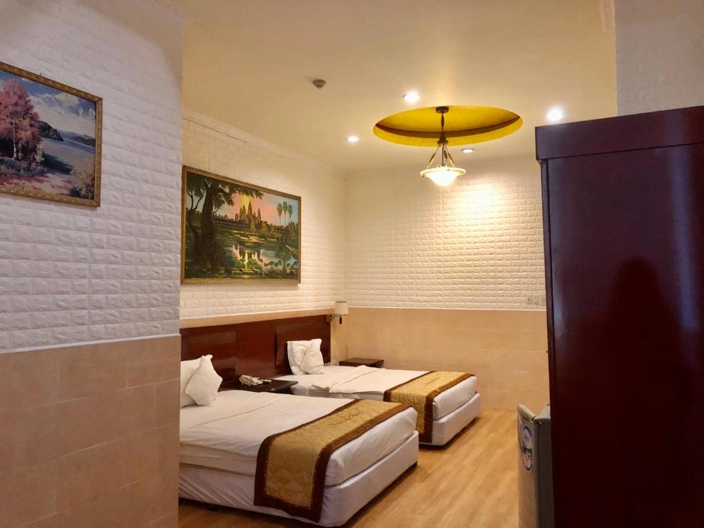 Двухместный (Двухместный номер Делюкс с 2 отдельными кроватями), Thang Loi Hotel