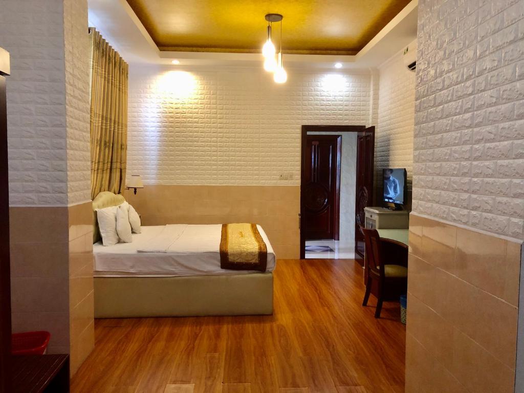 Двухместный (Улучшенный двухместный номер с 1 кроватью), Thang Loi Hotel