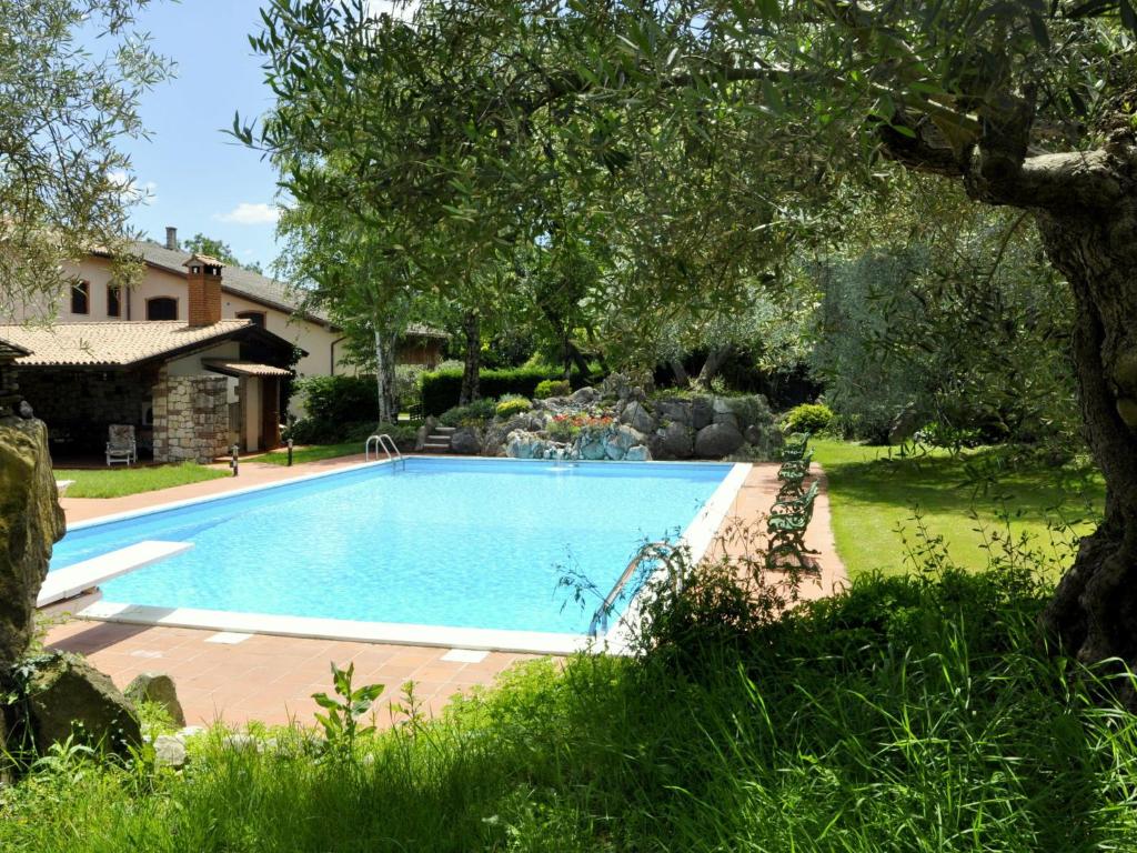 Quiet rustic farmhouse, surrounded by greenery, swimming pool with tennis court photo 1