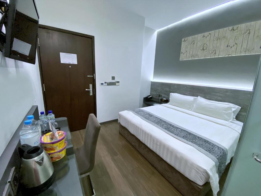 Двухместный (Улучшенный номер с кроватью размера «king-size»), Bliss Hotel Singapore