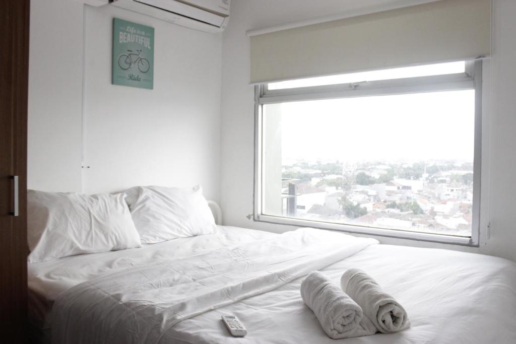 2BR Apartment Grand Asia Afrika near Alun-alun Bandung By Travelio, Bandung