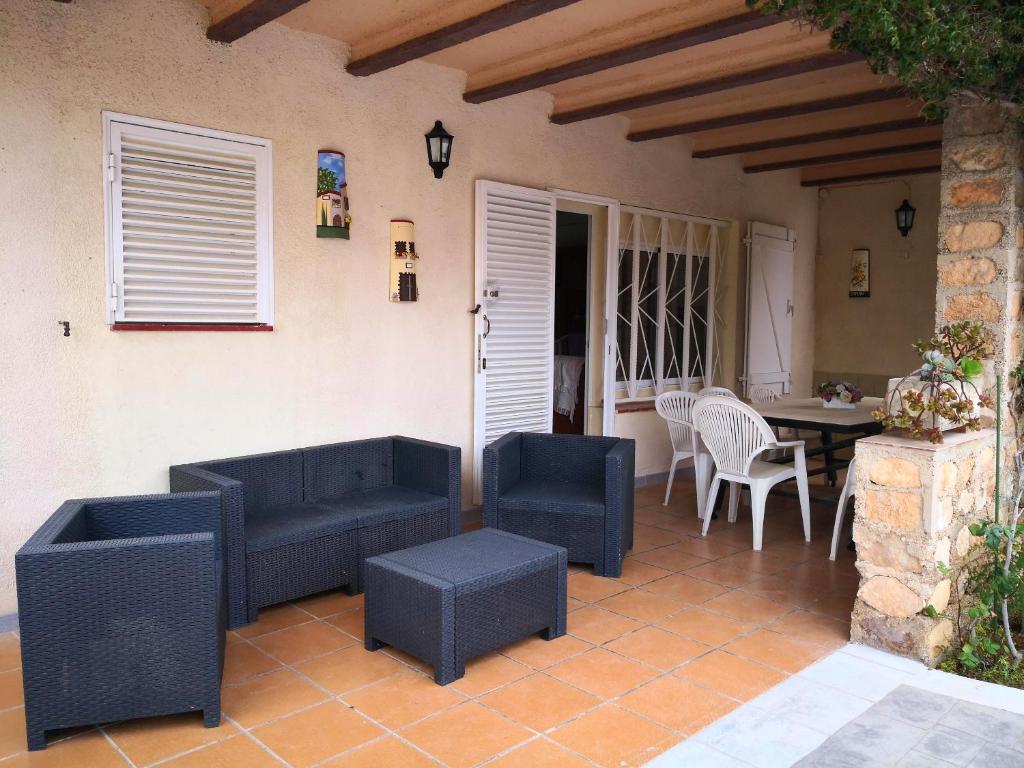5 bedrooms villa at Calafat 200 m away from the beach with sea view private pool and furnished garden photo 3
