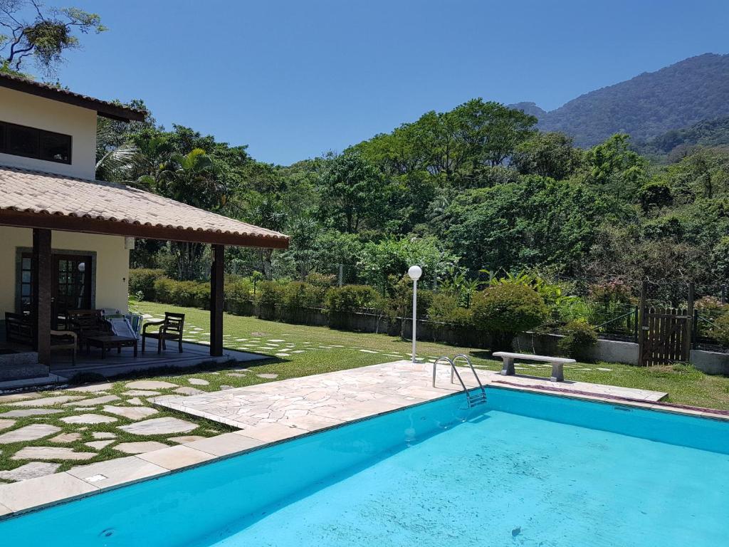 Casa da Josie em Maresias com piscina no pé da Mata Atlântica - 4 quartos photo 4