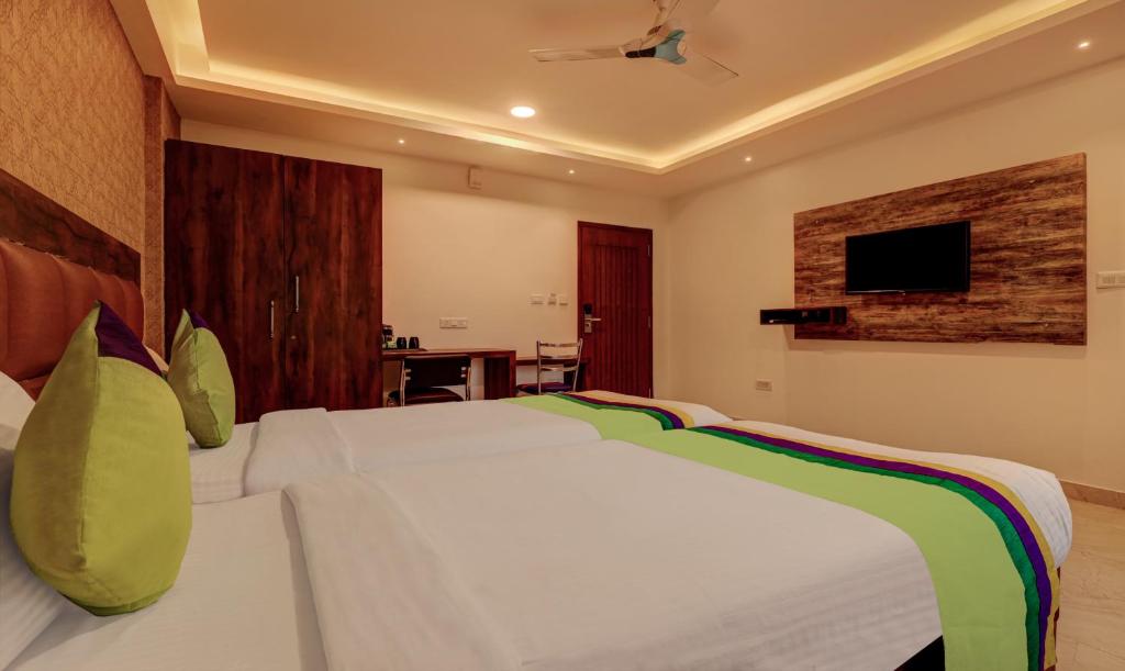 Двухместный ([Sanitized] Deluxe Double Room), Treebo Trend Ample Transit