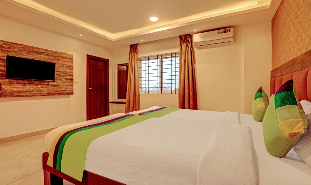 Двухместный ([Sanitized] Deluxe Double Room), Treebo Trend Ample Transit
