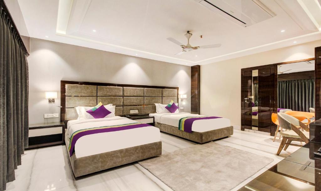 Двухместный ([Sanitized] Deluxe Double Room), Treebo Tryst Tahoora International