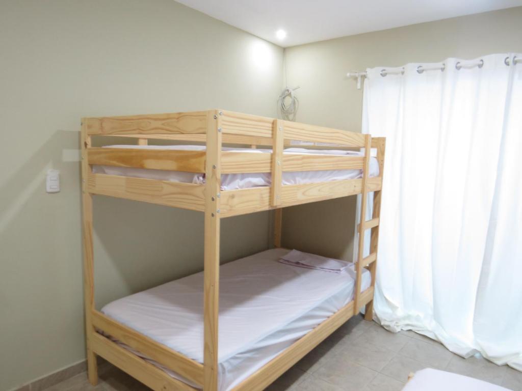 Номер (Односпальная кровать в общем номере (для 4 гостей)), Hostel Punta Cana