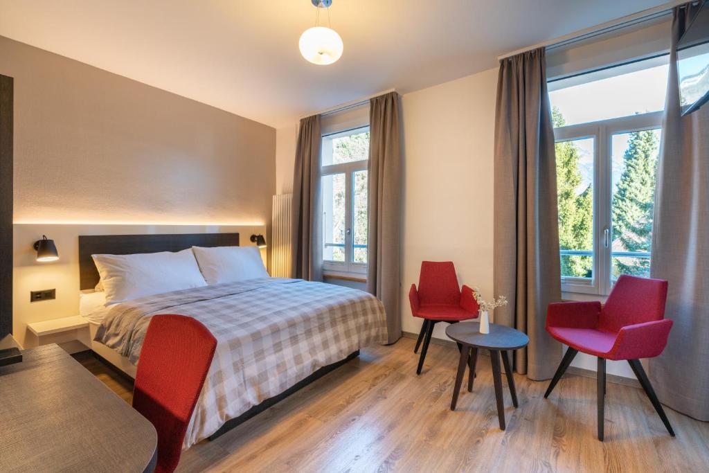 Hotel Derby Interlaken - self check-in - Tap to explore photos
