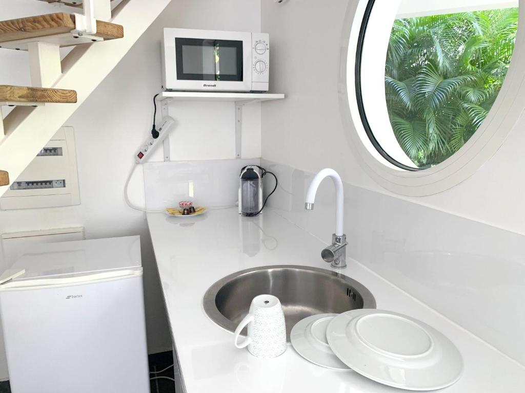 Appartement d'une chambre a Le Moule a 200 m de la plage avec piscine privee terrasse amenagee et wifi photo 4
