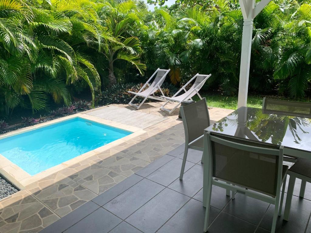 Appartement d'une chambre a Le Moule a 200 m de la plage avec piscine privee terrasse amenagee et wifi photo 1