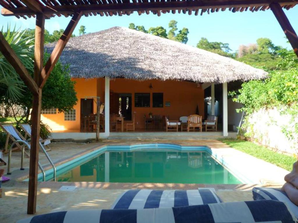 2 bedrooms bungalow with sea view shared pool and enclosed garden at Andilana photo 1
