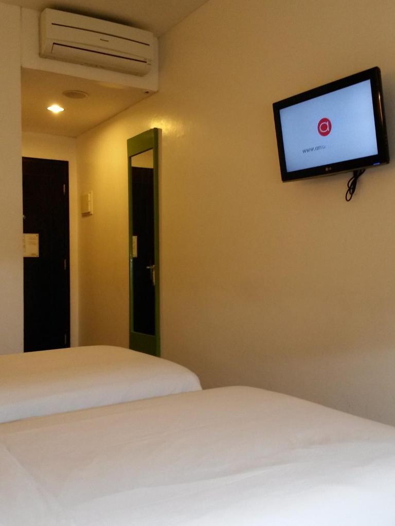 Двухместный (Двухместный номер «Смарт» с 2 отдельными кроватями), Amaris Hotel Panglima Polim 2