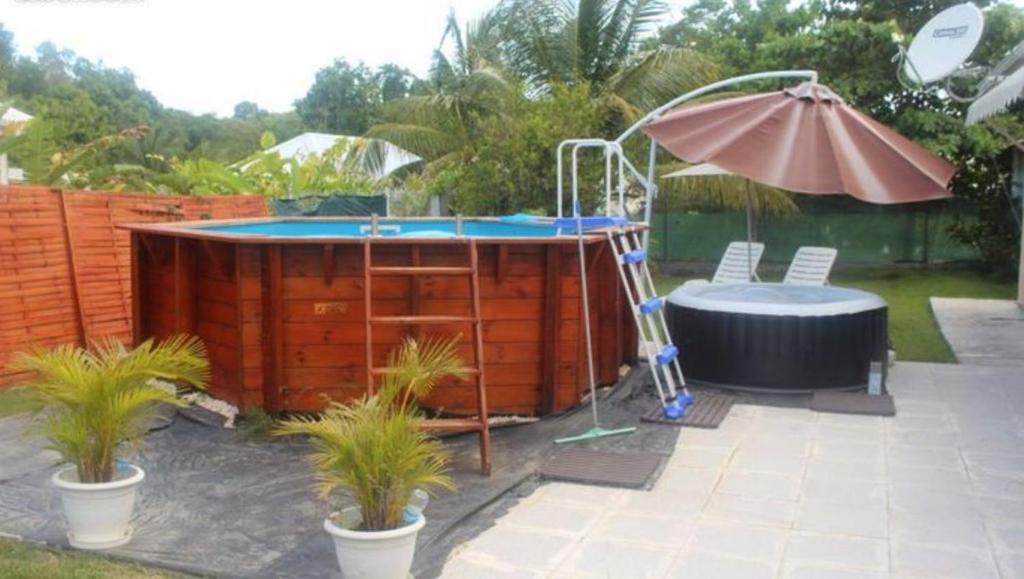 Villa de 3 chambres a Sainte Anne a 500 m de la plage avec piscine privee jacuzzi et jardin clos photo 2