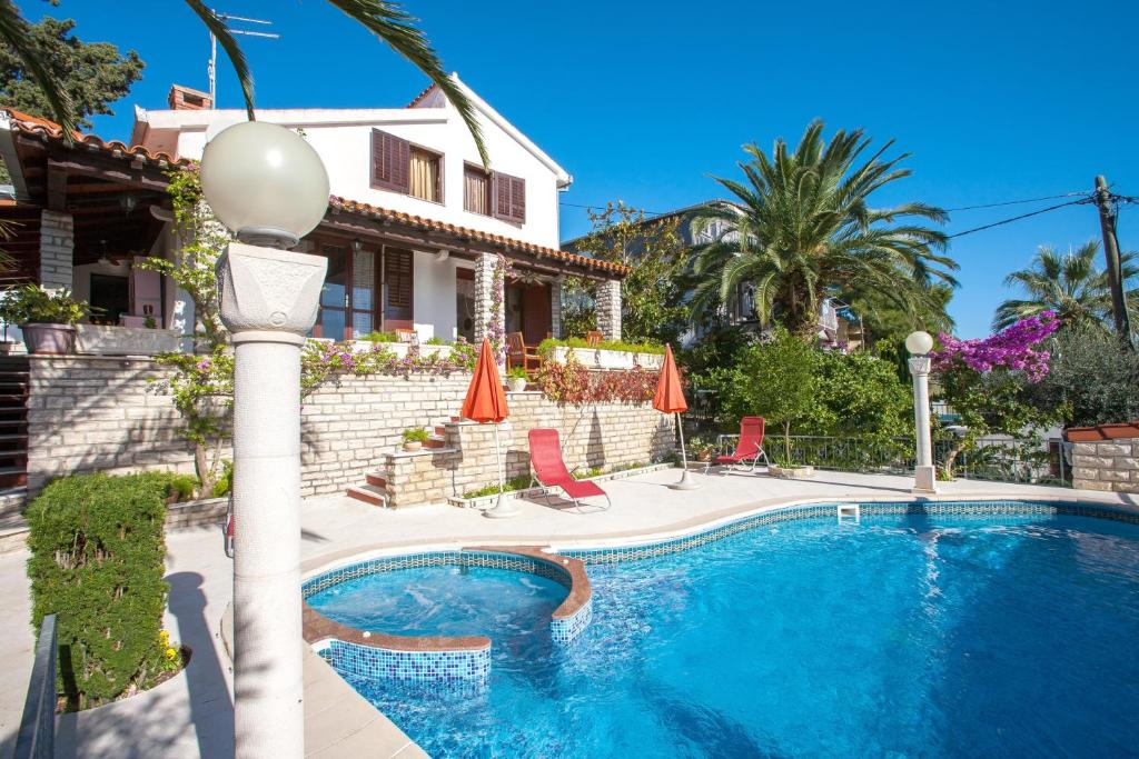 4 bedrooms villa at Seget Vranjica 80 m away from the beach with sea view private pool and jacuzzi photo 1
