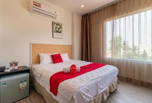 Двухместный (Улучшенный двухместный номер с 1 кроватью), AAN Lộc Phú Hotel