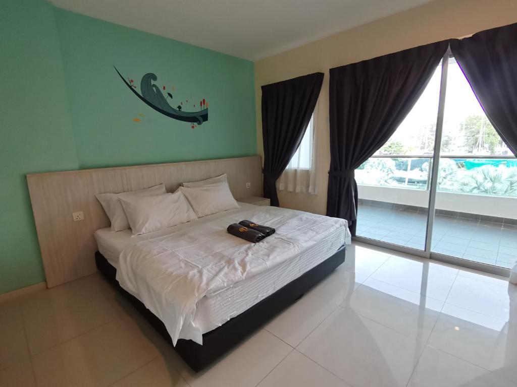 Marina Island Lumut Homestay by Goopro photo 3