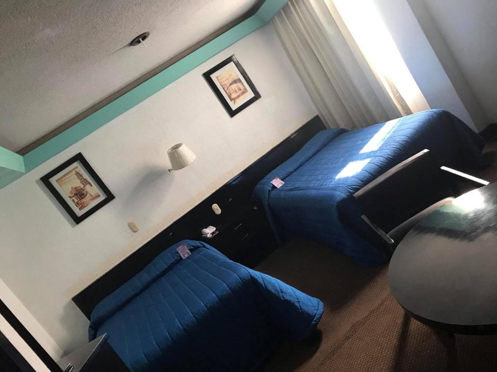 Hotel Real Rex Room Type - Standard Quadruple Room