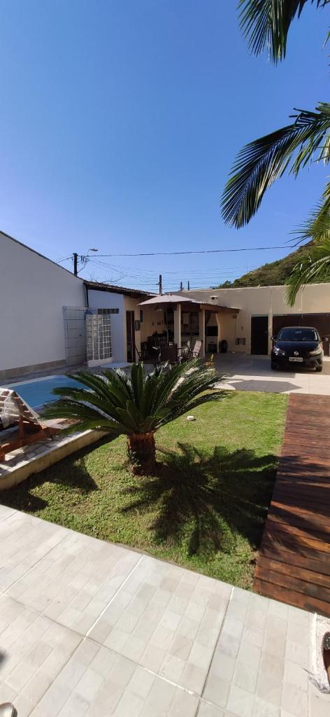 Casa Caraguatatuba com Piscina e Wifi photo 1