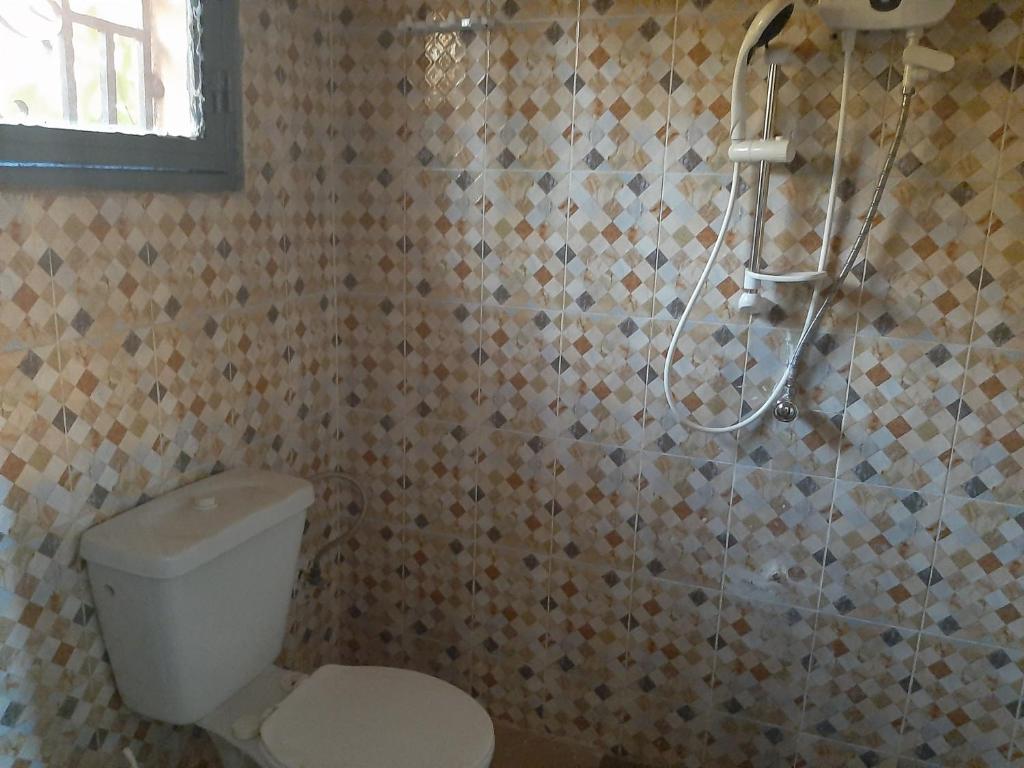 Villa Chambre A climatisée douche Cuisine salon photo 3