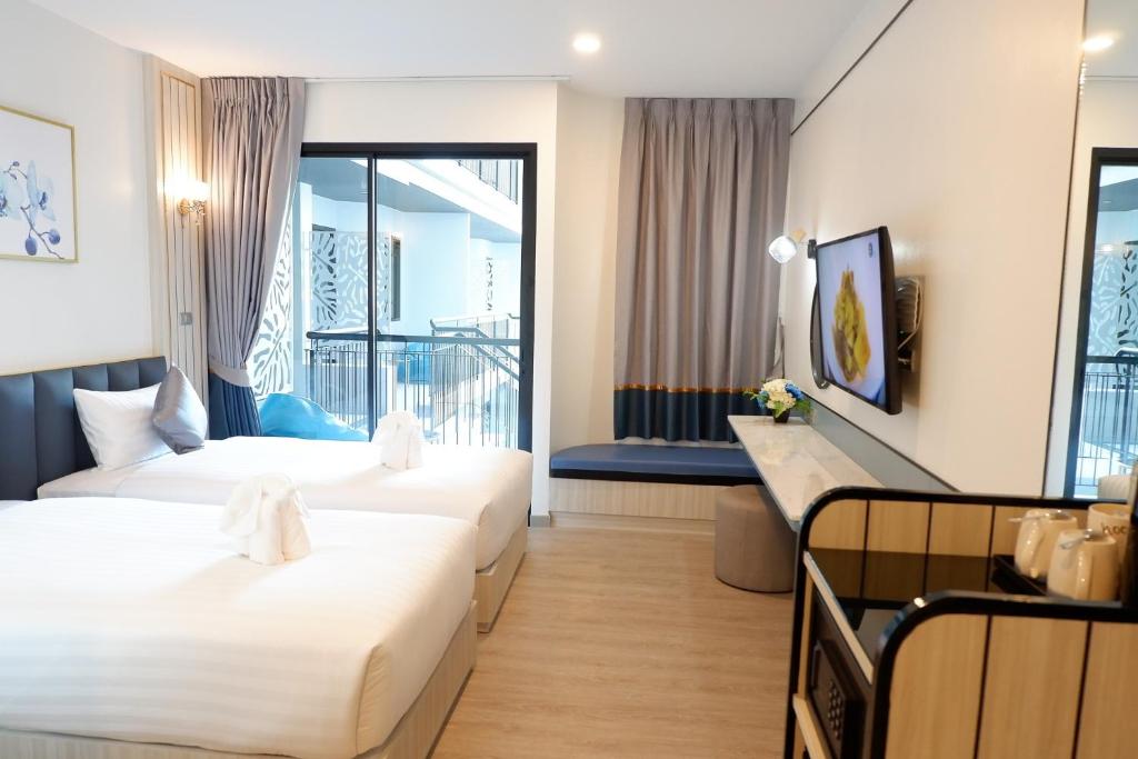 Poolrada Boutique Hotel - SHA Plus - Tap to explore photos