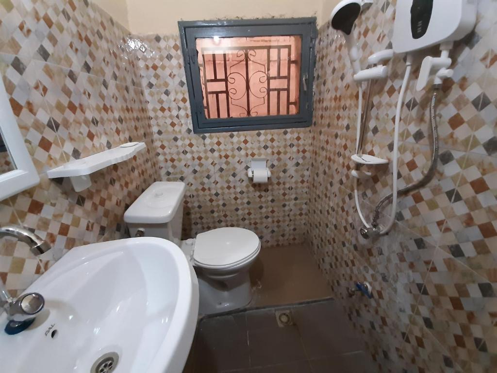 Villa Chambre C climatisée douche Cuisine salon photo 3