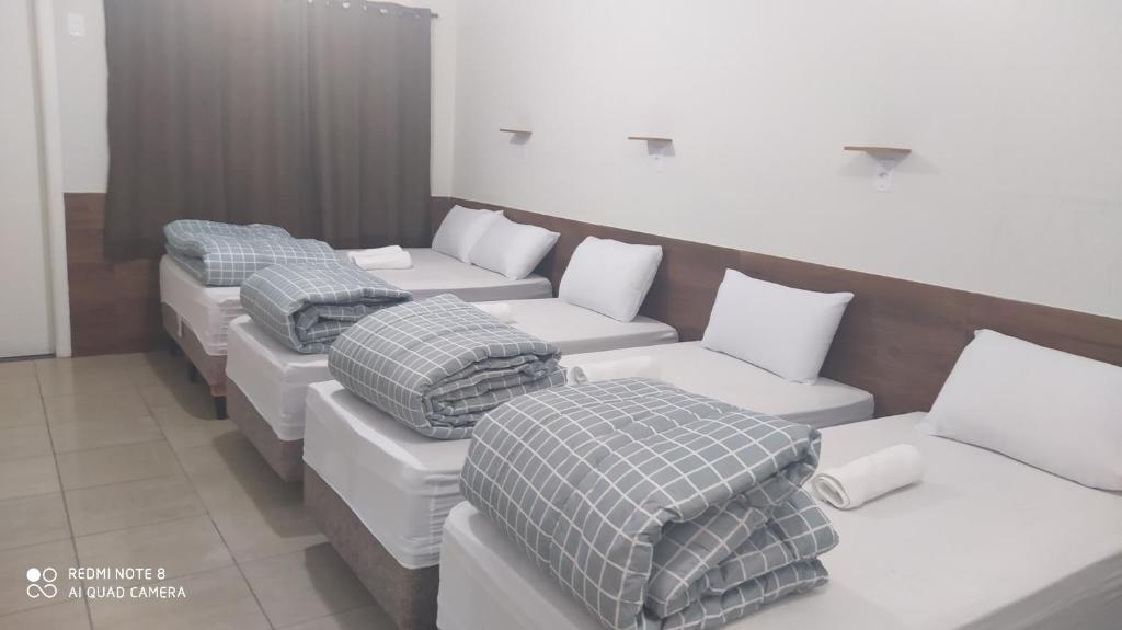 Quarto Suíte Famíliar com ar,frigobar, wi fi e garagem