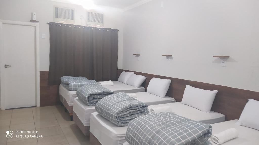 Quarto Suíte Famíliar com ar,frigobar, wi fi e garagem photo 1