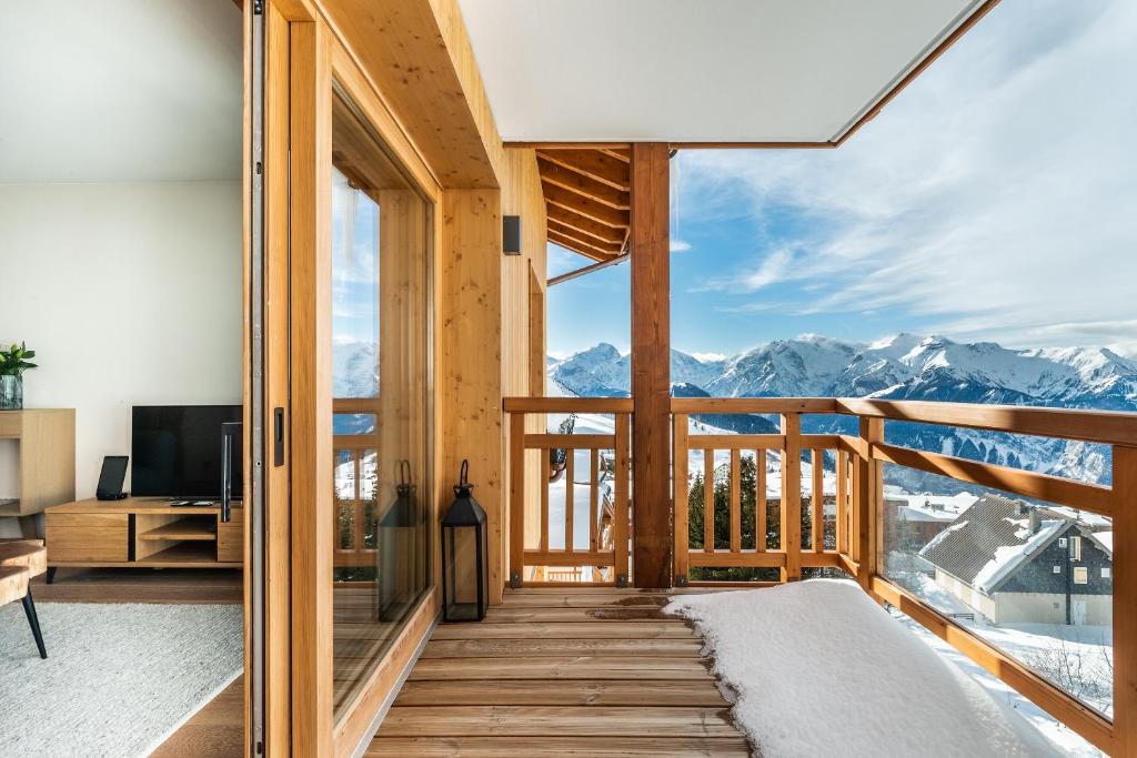 Residence Hameau de Clotaire Alpe d'Huez - by EMERALD STAY photo 1