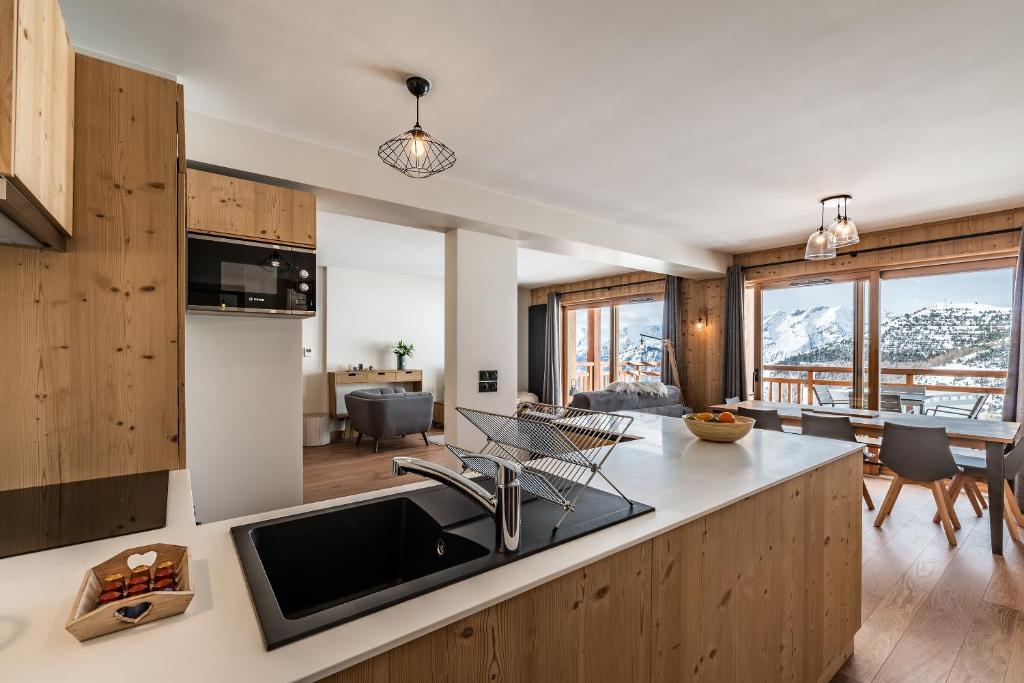 Residence Hameau de Clotaire Alpe d'Huez - by EMERALD STAY photo 3