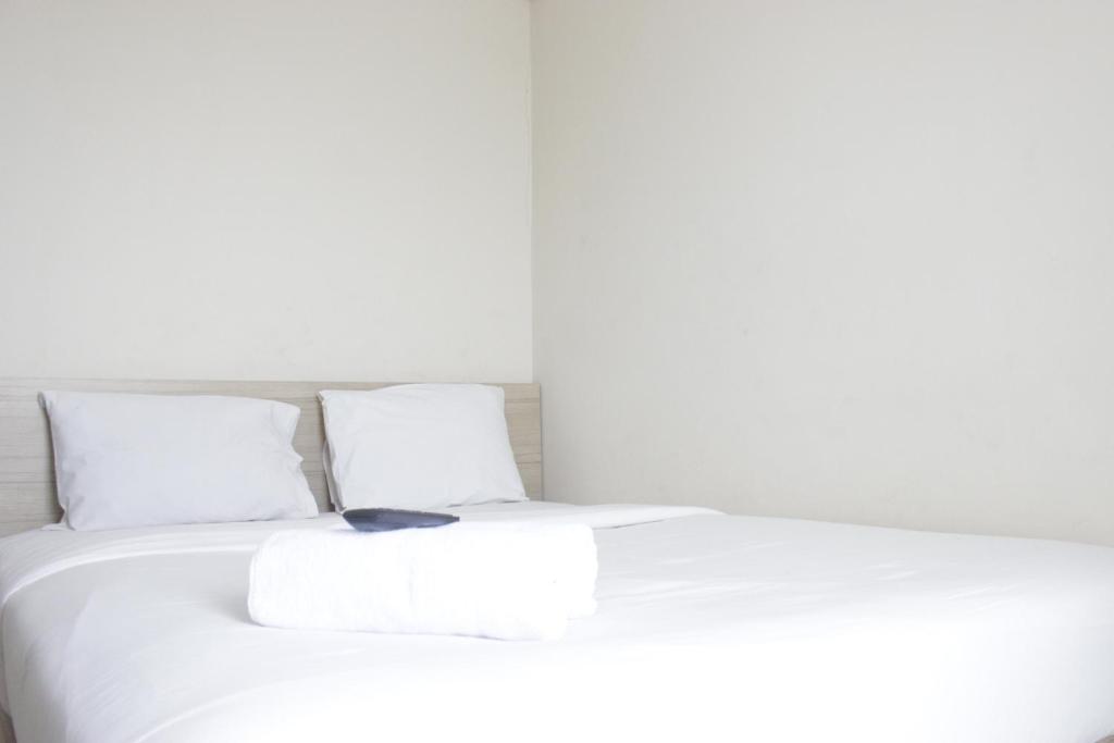 Best Location 2BR Tamansari La Grande Apartment By Travelio, Bandung