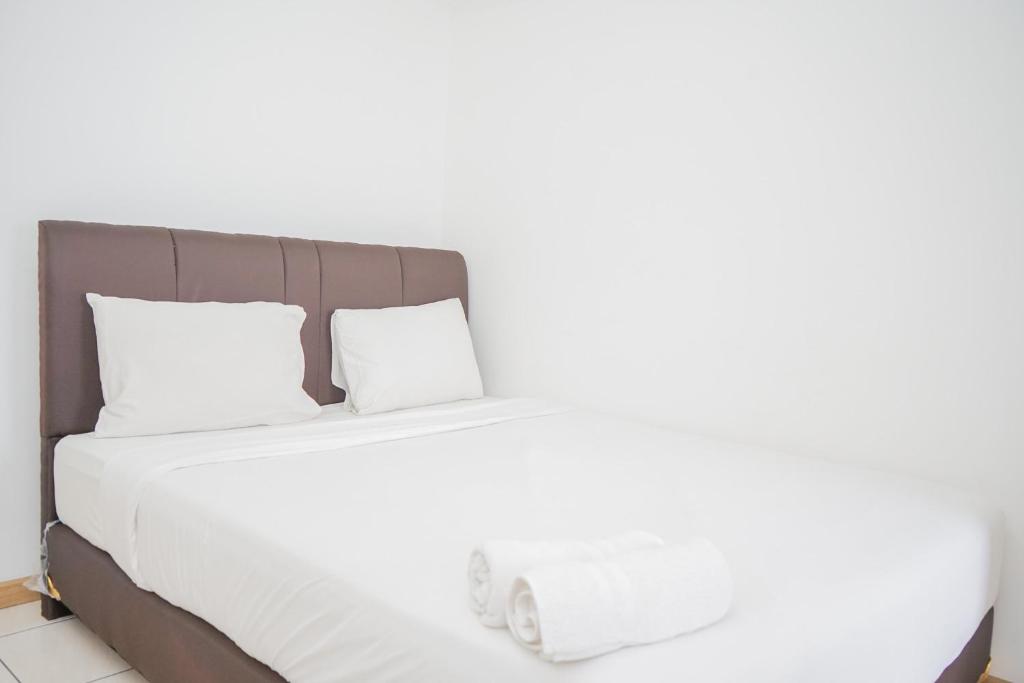 Comfort and Spacious 2BR Apartment M-Town Residence By Travelio