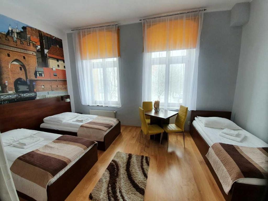 Трехместный (Трехместный номер с ванной комнатой), Hotelik w Centrum