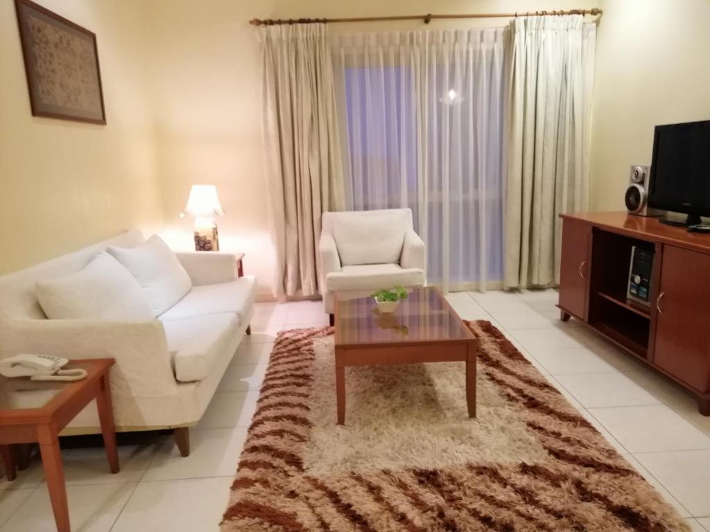 Stayinn Gateway Hotel Apartment - Tap to explore photos