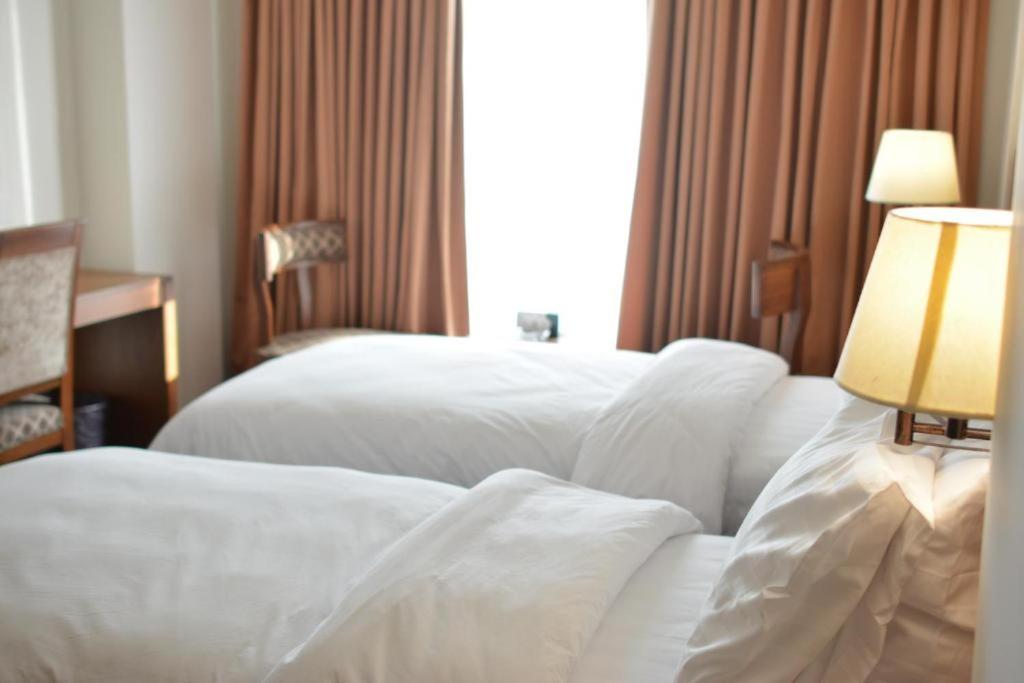 Esquire Hotels & Apartments