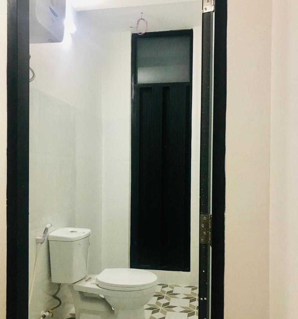 Двухместный (Двухместный номер Делюкс с 1 кроватью и балконом), Nắng Homestay with balcony