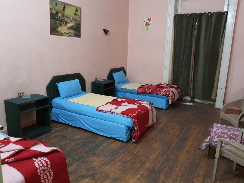 Четырехместный (Четырехместный номер с общей ванной комнатой), African House Hostel