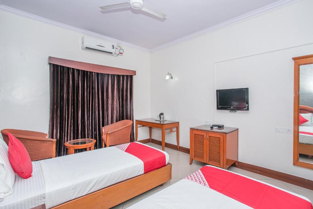 Трехместный (Трехместный номер Делюкс), OYO 592 Hotel Chetan International