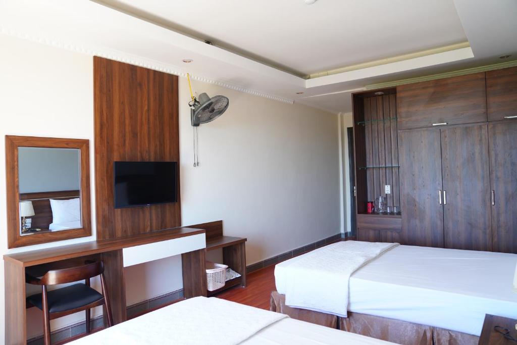 Четырехместный (Улучшенный четырехместный номер), Hon Ngu Hotel