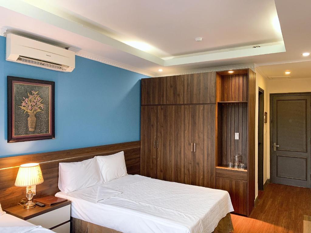 Четырехместный (Улучшенный четырехместный номер), Hon Ngu Hotel