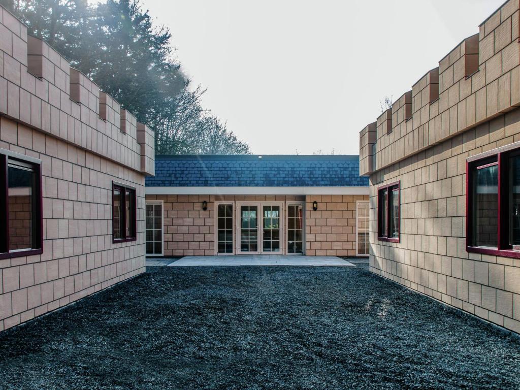 Designed home with bedstead, surrounded by forest photo 1