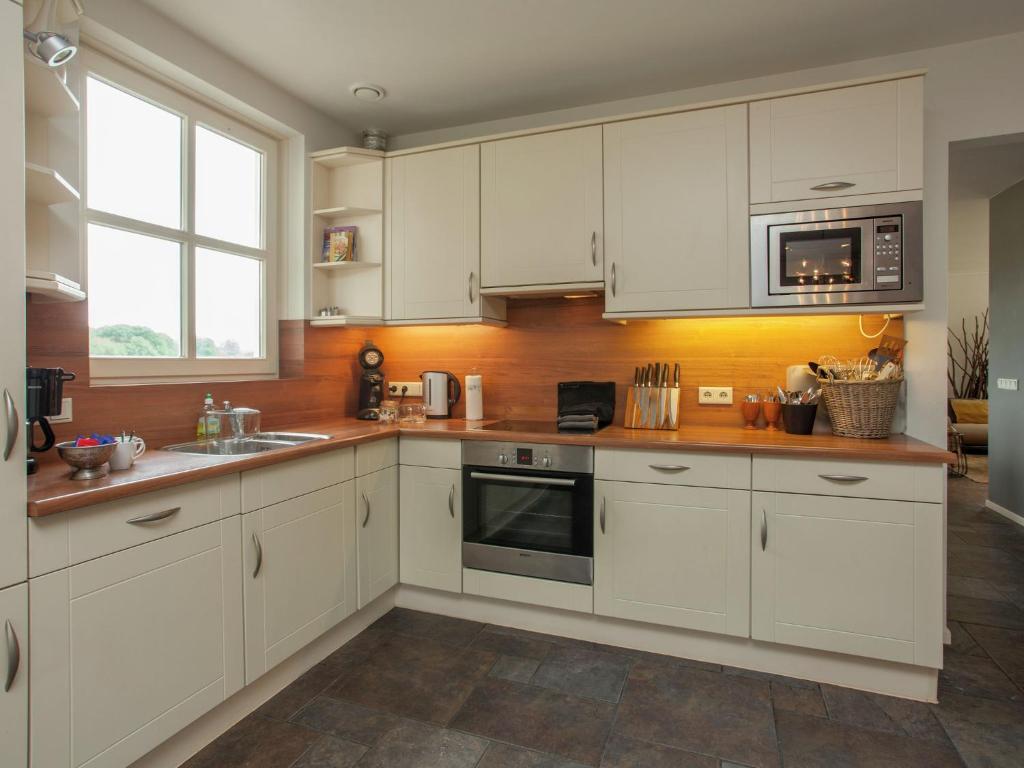 Luxurious holiday home in the middle of the Leenderbos nature reserve, near quiet Leende photo 4