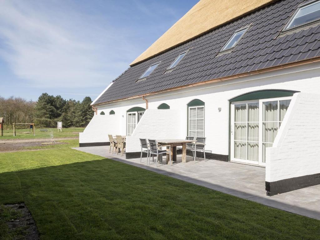 Spacious Farmhouse in De Cocksdorp with Private Terrace photo 1