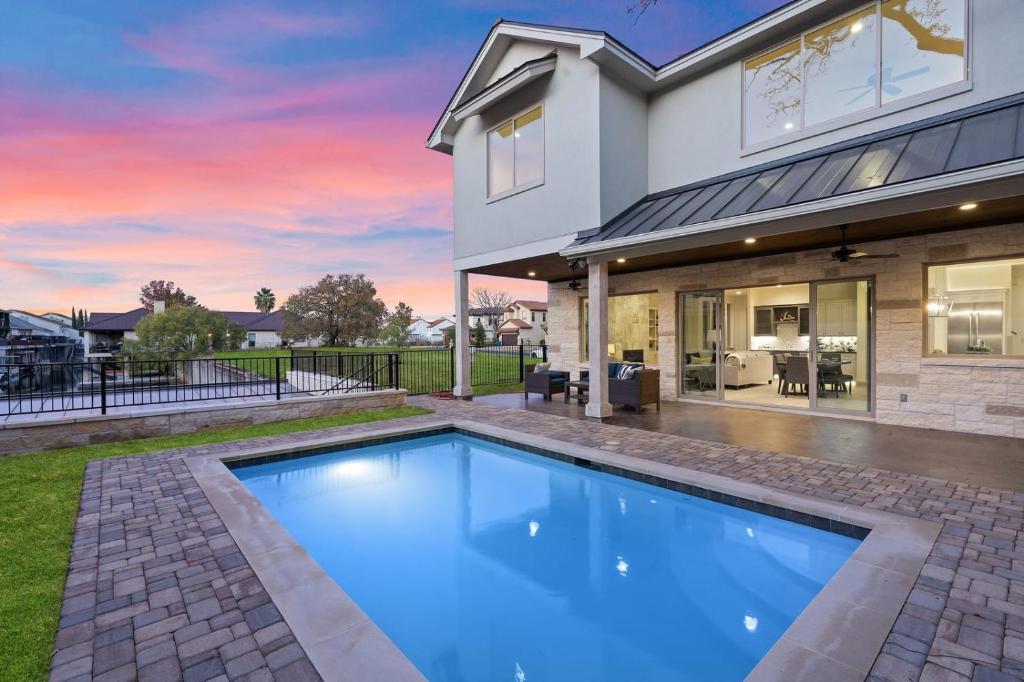 Contemporary, Luxury Retreat on Lake LBJ with Heated Pool image