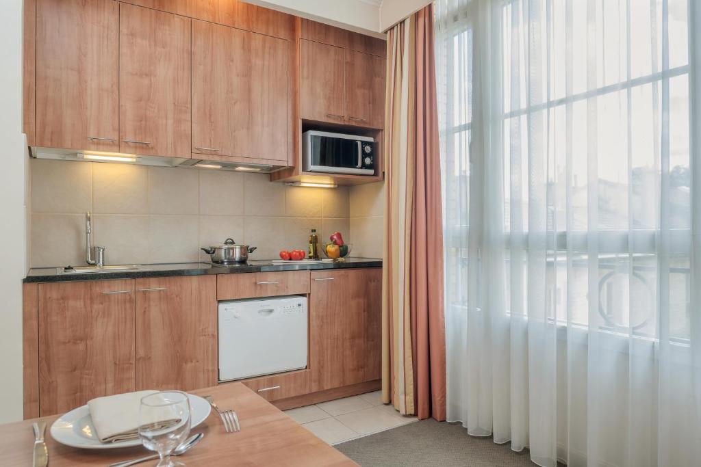 Четырехместный (Апартаменты (для 4 взрослых)), Citadines Saint-Germain-des-Prés Paris