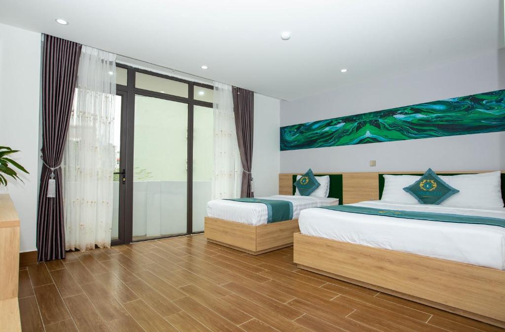 Двухместный (Двухместный номер Делюкс с 2 отдельными кроватями), Emerald Hotel Cát Bà